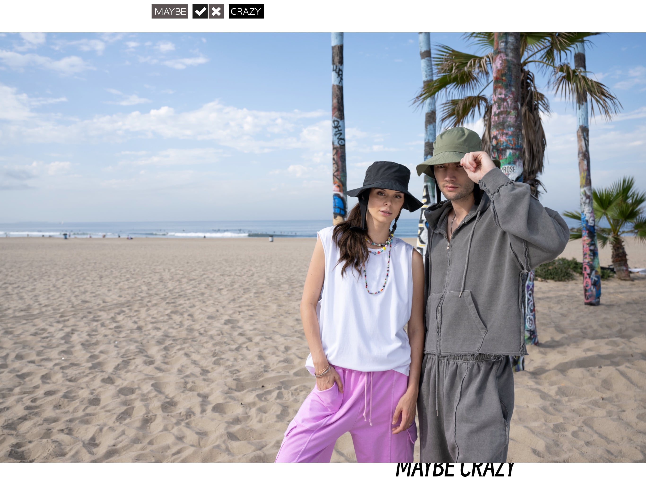 maybe crazy couple models wearin white cut and grey hoodie