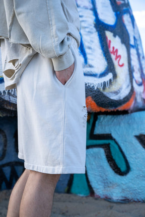 Creamy White Distressed Shorts